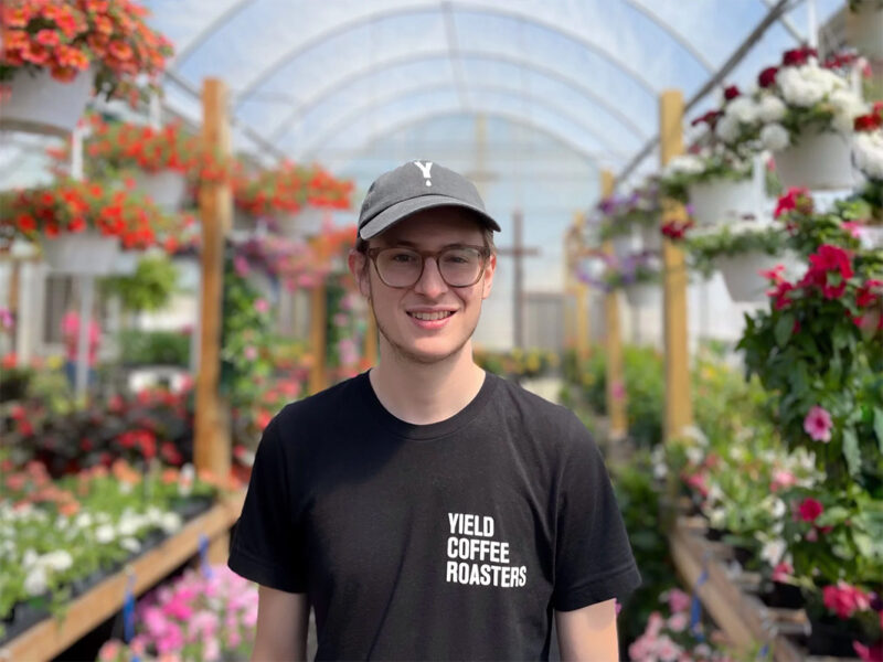 Andrew from Yield Coffee in the Greenhouse