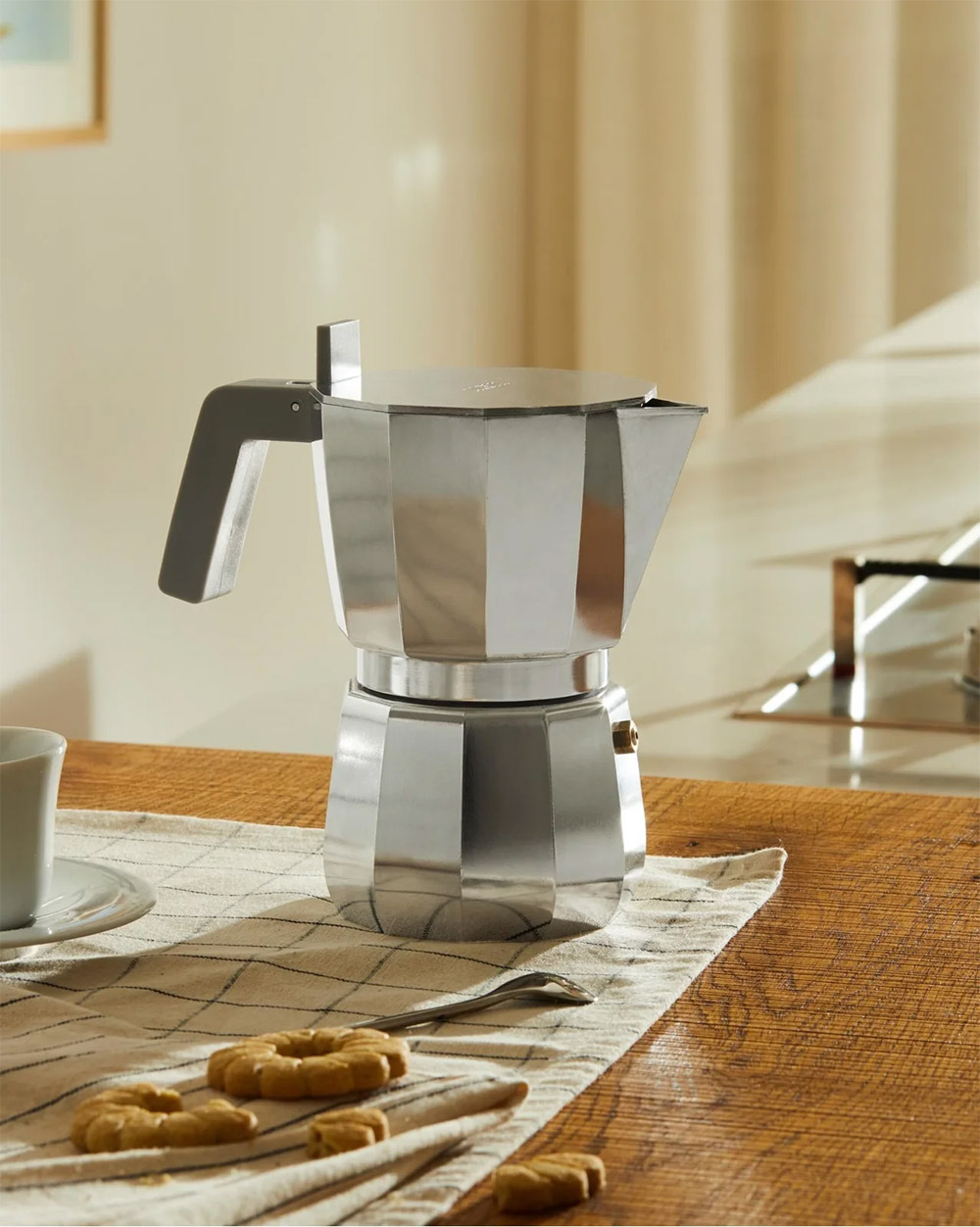 https://makerscoffee.com/wp-content/uploads/2023/07/Alessi-Moka-Espresso-Coffee-Maker-Breakfast-Table.jpg